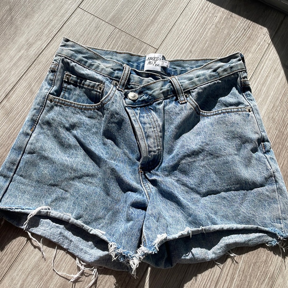 princess Polly denim cross waist shorts